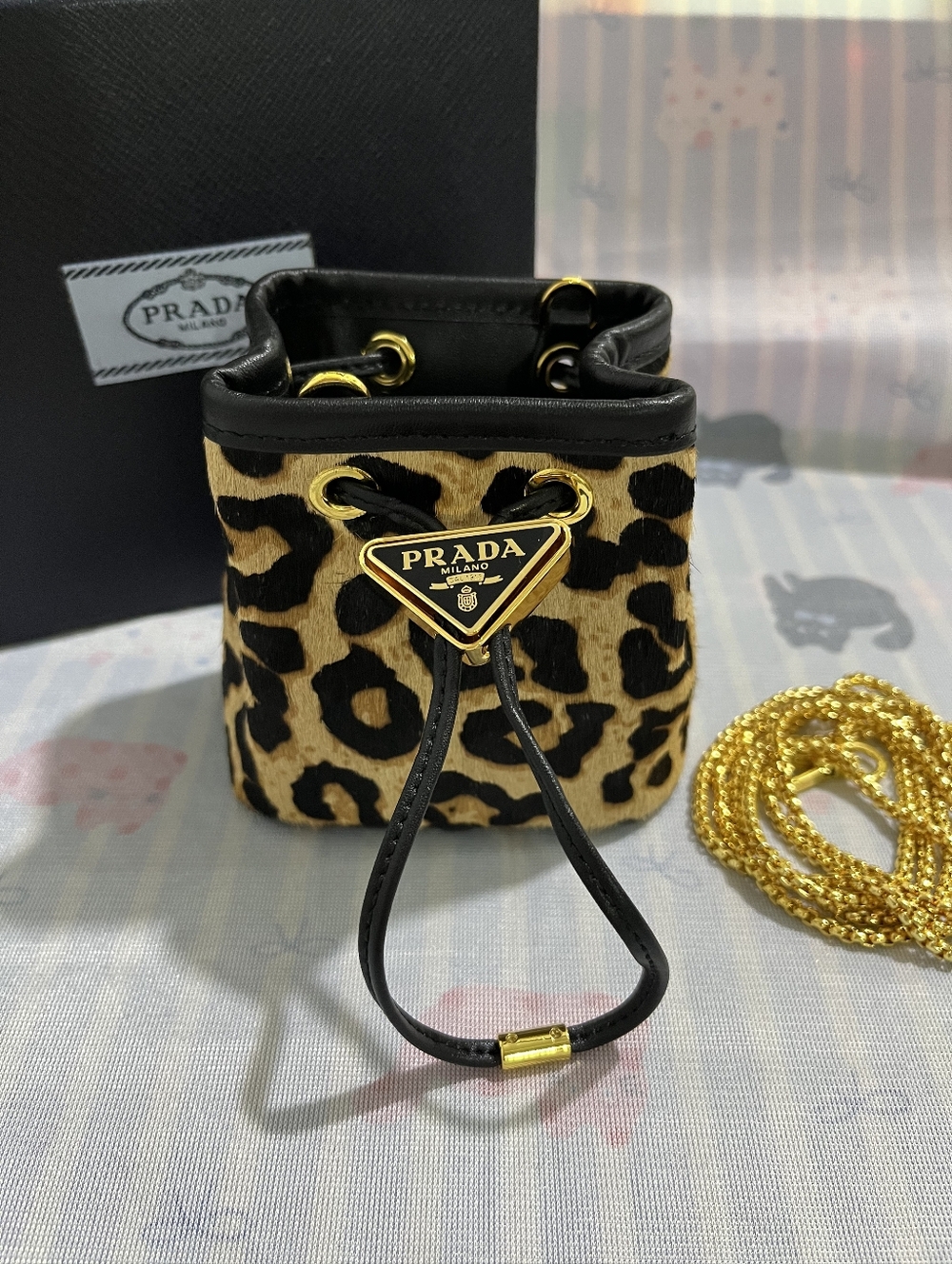 🤩 Prada Leopard-Print Calf Hair Mini Bucket Bag